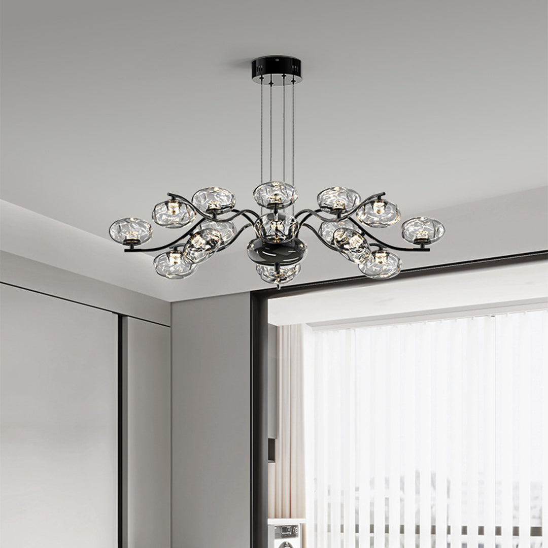 Contemporary modern LED chandelier installed above dining table creating ambient lighting in modern interior