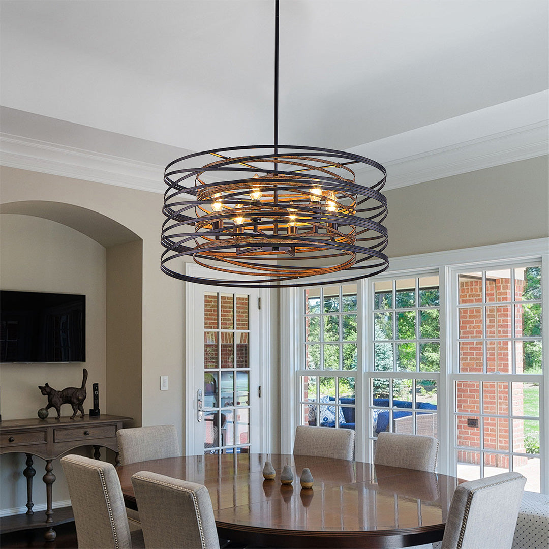Black drum pendant light above a dining table, creating a warm and inviting atmosphere for meals.