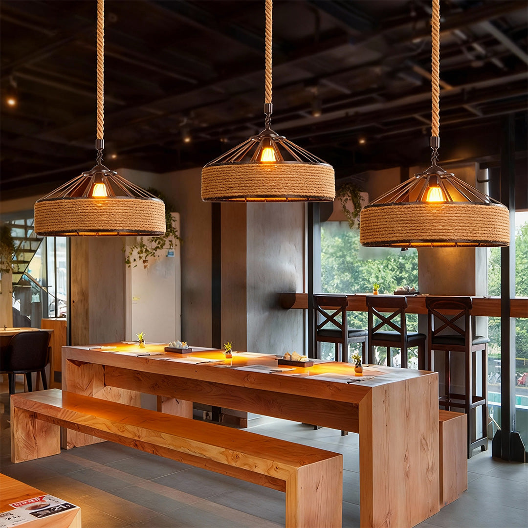 Rustic circular pendant light above a dining table, warm and stylish lighting for gatherings