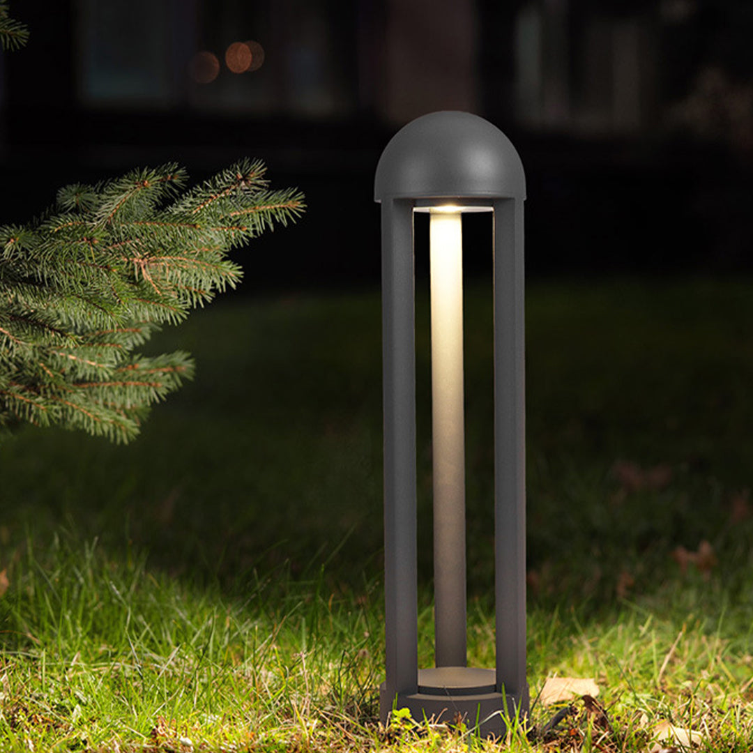 Sleek cylindrical lights providing directional pathway lighting with vertical light output