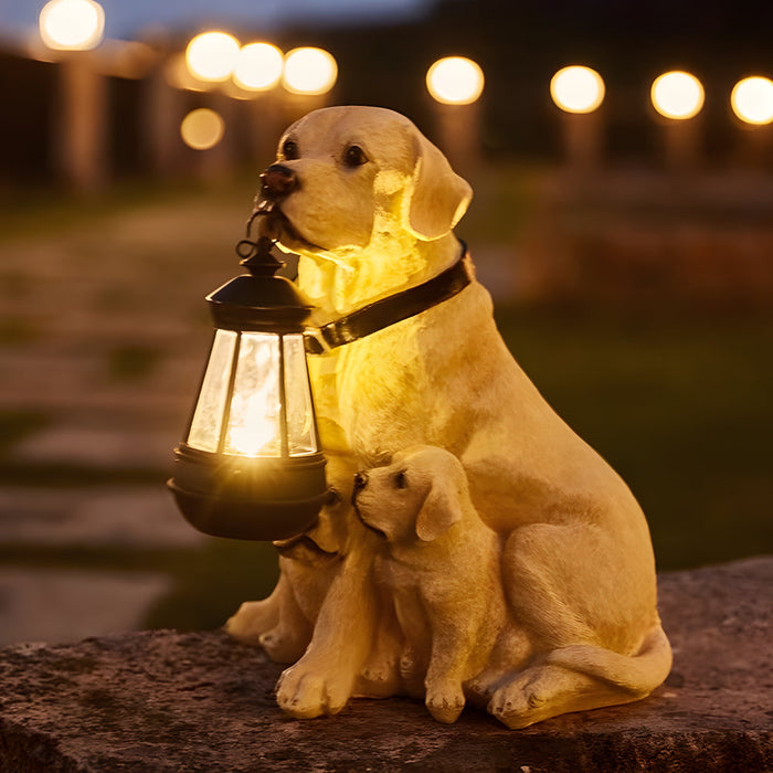 Dog solar light statue featuring a golden retriever holding a lantern with a puppy