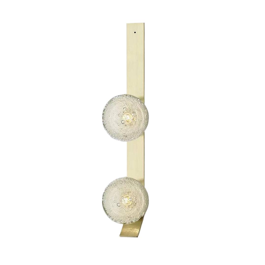 Modern double-globe brass wall light fixture with vertical mounting design for interior spaces