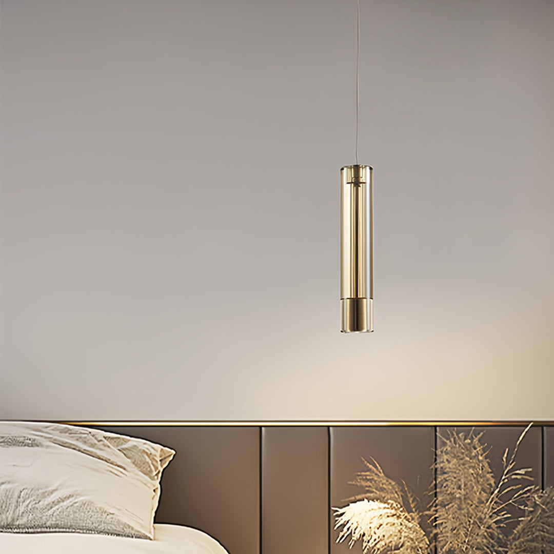 Double hanging pendant light installed in modern bedroom creating warm ambient lighting over headboard