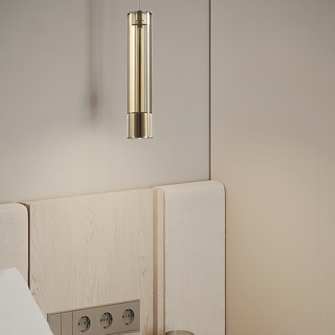 Double hanging pendant light installation in luxury bedroom with brass finish complementing warm decor