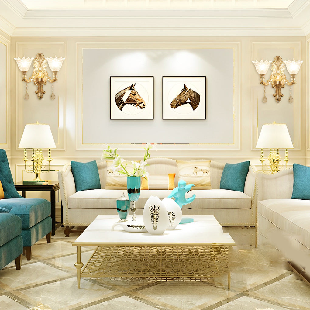 Double lamp wall lights with a close-up of their ornate gold and crystal details.