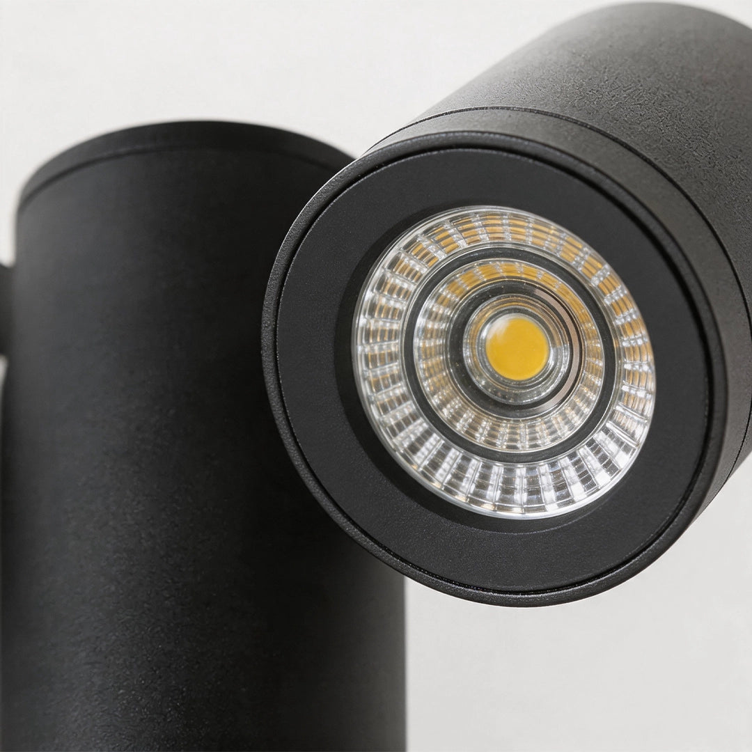 Close-up of the LED lens and black head detail on a double light bollard light.