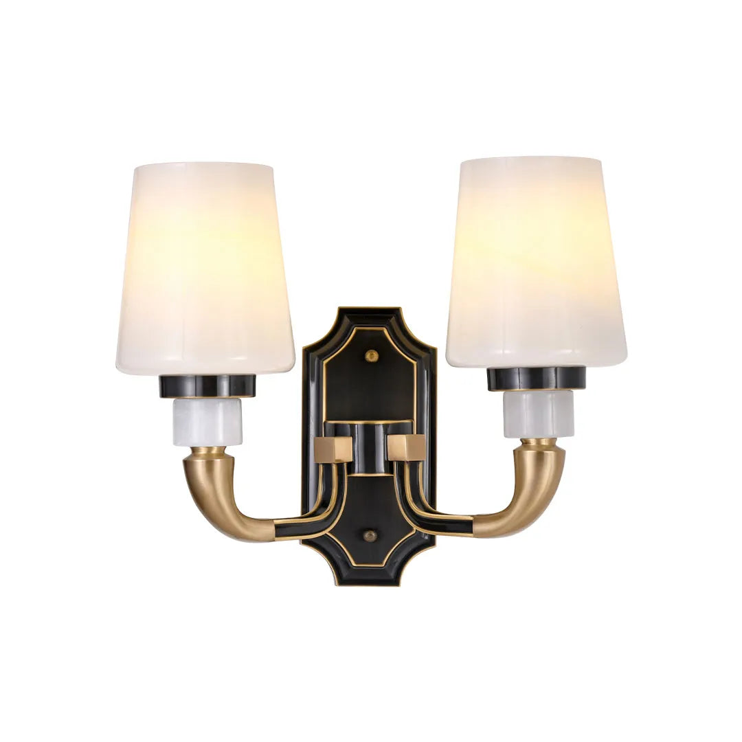 Brass candle sconces wall featuring two lights, curved brass arms, and decorative black backplate.