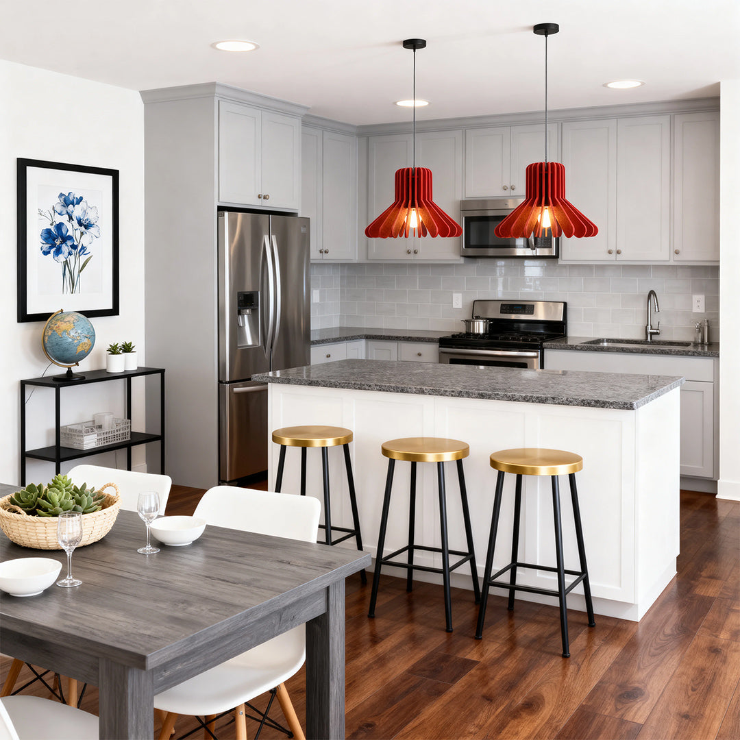 Double red felt fabric tiny pendant lights over a kitchen island with white countertop 