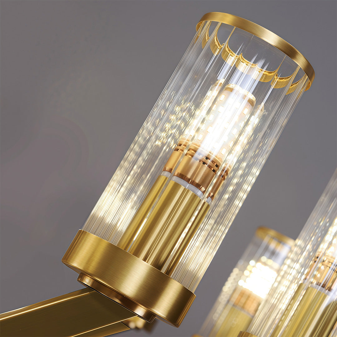 Modern luxury chandeliers style double sconce wall light close up showcasing brass and glass detail.