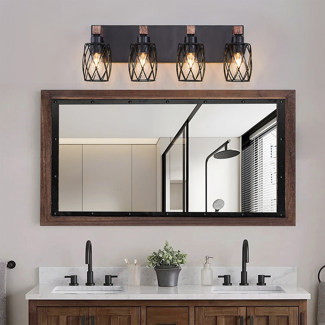 Black vanity bathroom light with three bulbs, installed above a double sink vanity with a large mirror.