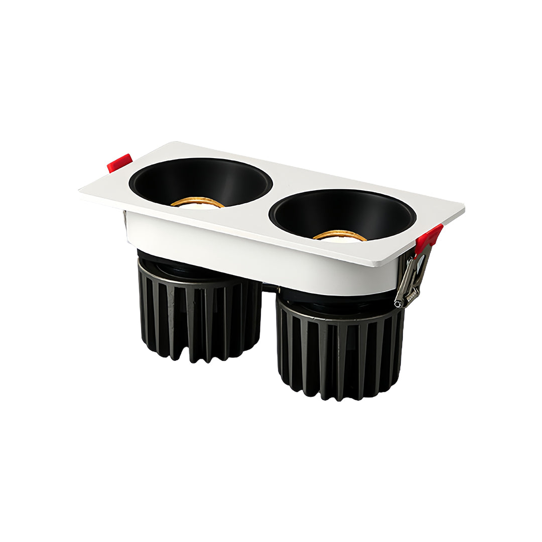 Sleek triple square recessed downlight with black interior and white frame