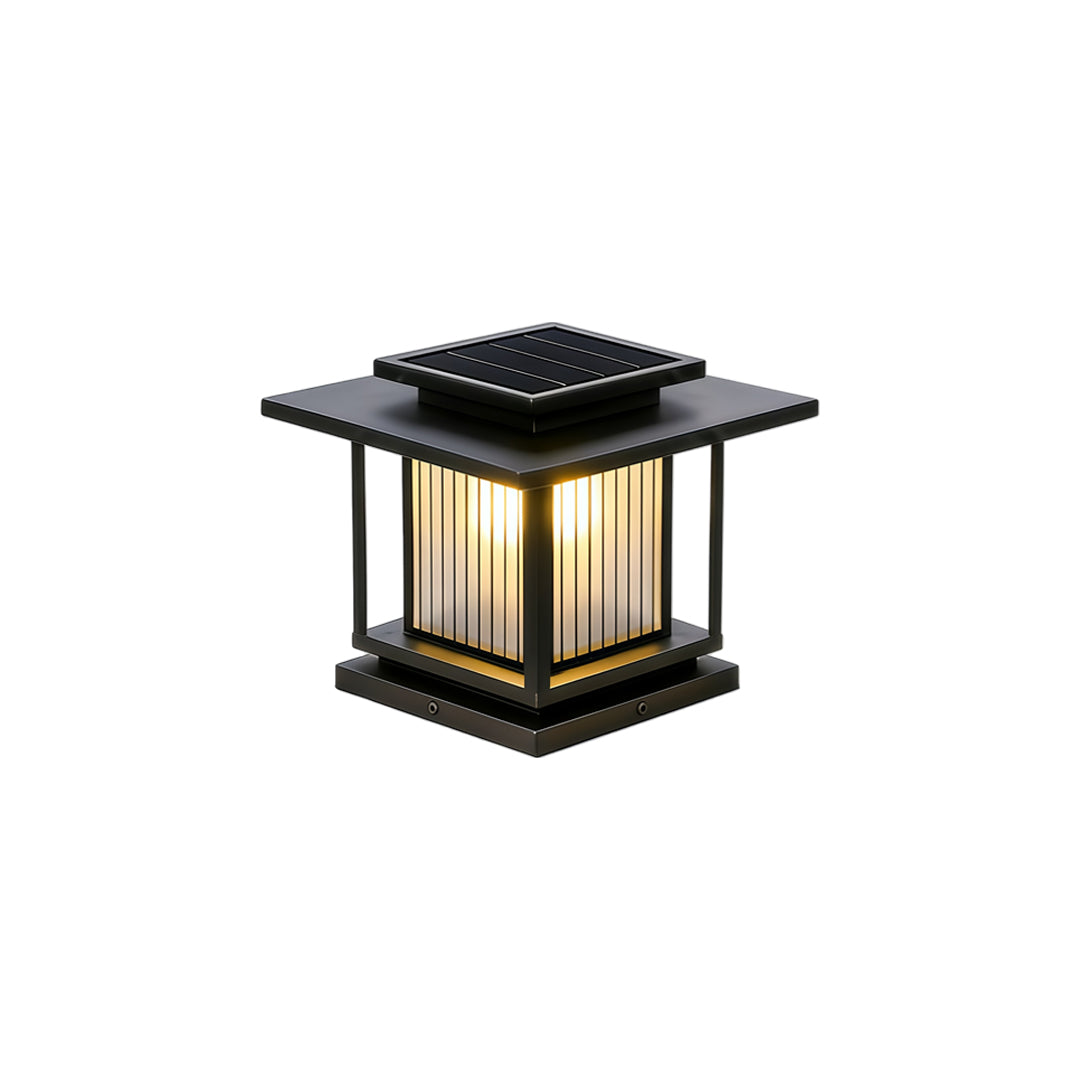 Driveway pillar solar lights installed on modern fence posts with warm evening illumination.