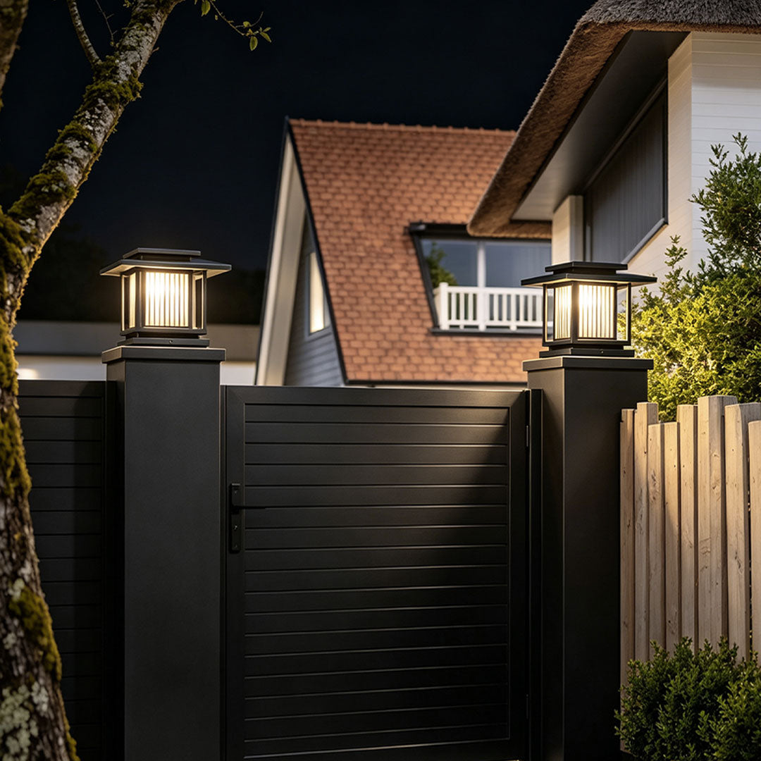 Close-up solar panel detail of driveway pillar solar lights with sleek black housing finish.