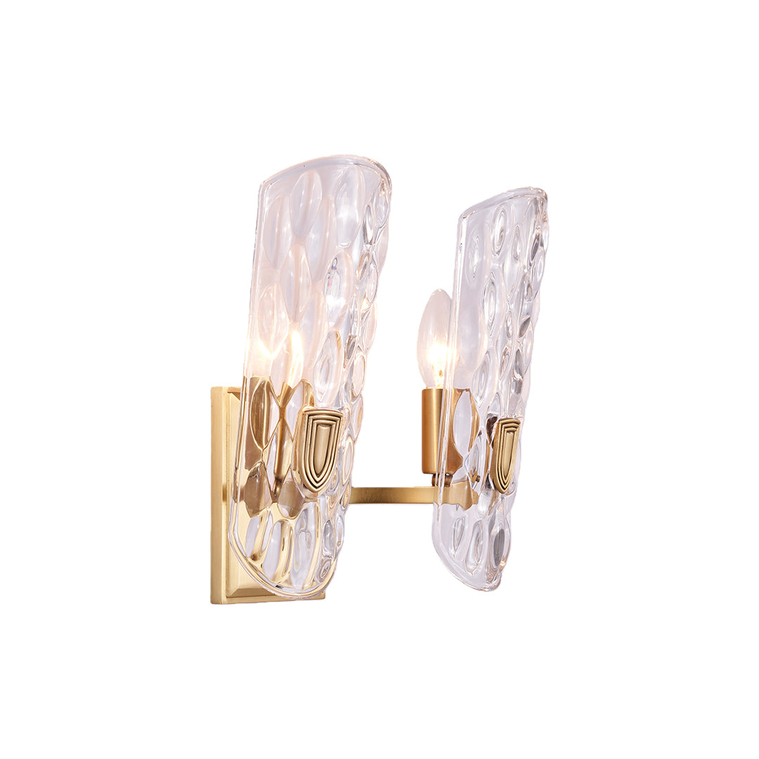 Brass glass wall light featuring dual arms with vertical crystal glass elements