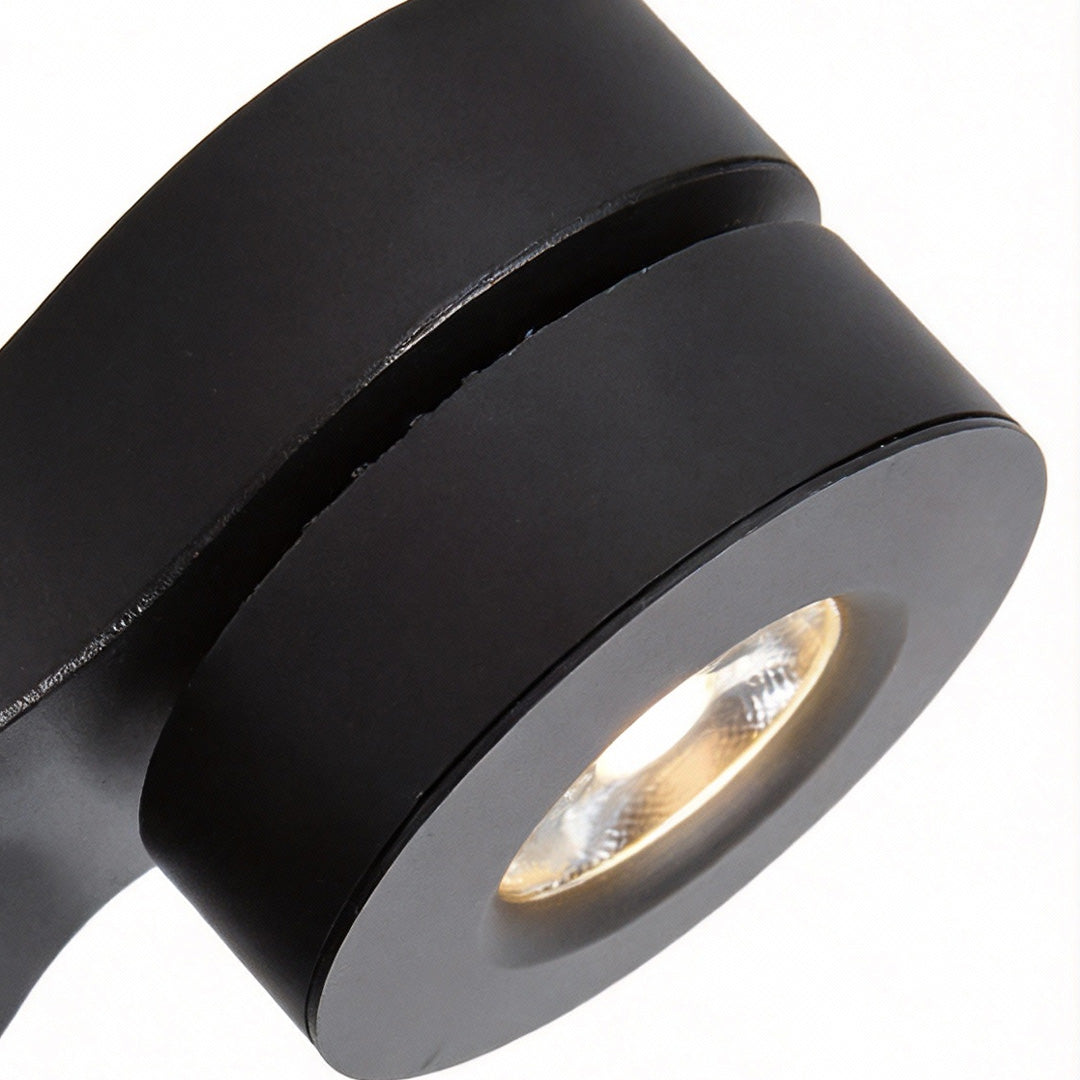 Modern dual-head surface mount LED downlight with white finish, offering adjustable angles for flexible lighting in contemporary settings.