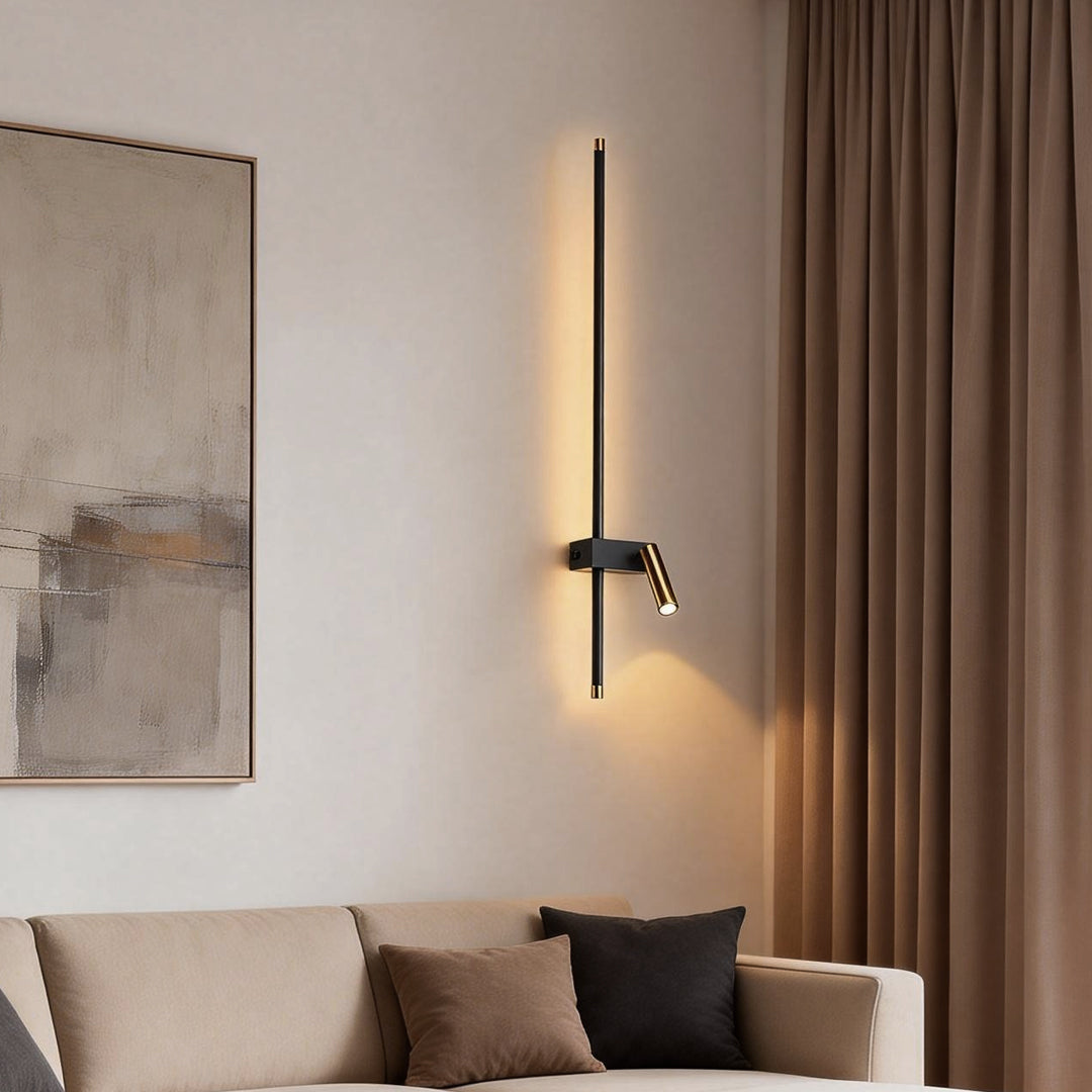 Modern living room styled with a vertical dual light wall sconce providing ambient and reading light.