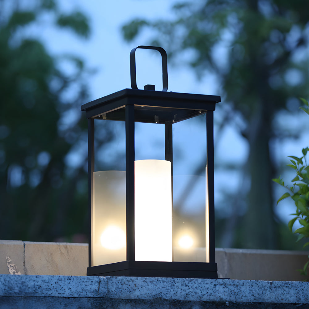 Silver Metal Table Lamp outdoor lantern glowing at dusk on patio surface with atmospheric blue hour lighting