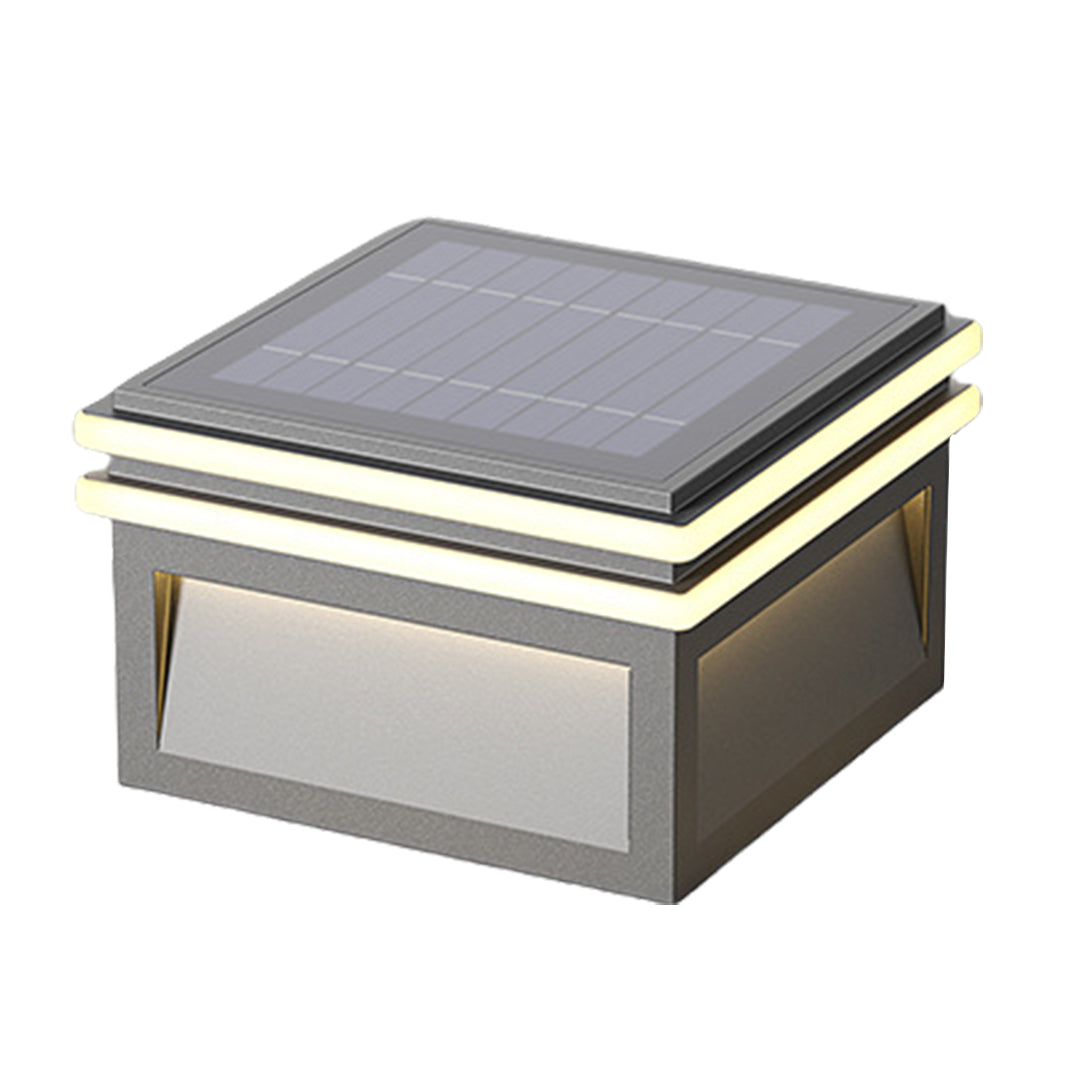 Modern cubic wall-mounted light fixtures creating dramatic architectural illumination on contemporary building facade at night