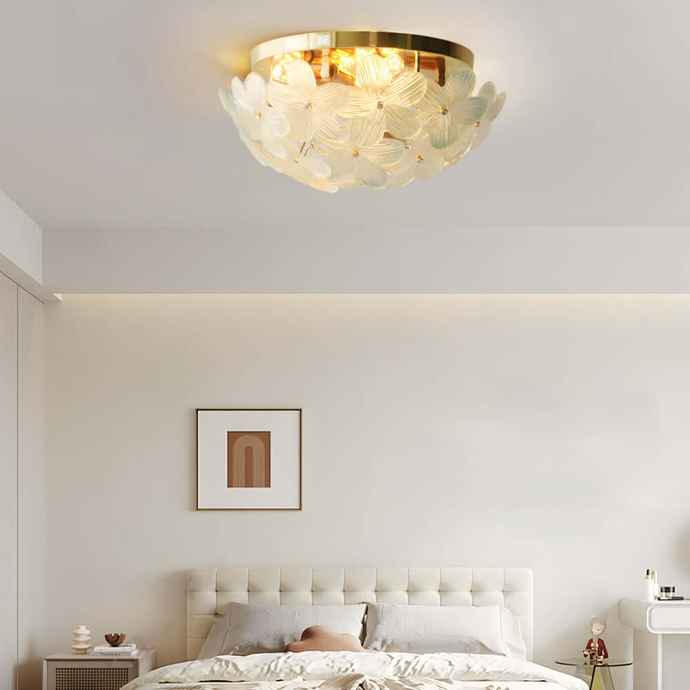 Featuring sparkling glass petals and a sleek semi flush mount design, this French-inspired ceiling light creates a stunning visual centerpiece in any room of your home.