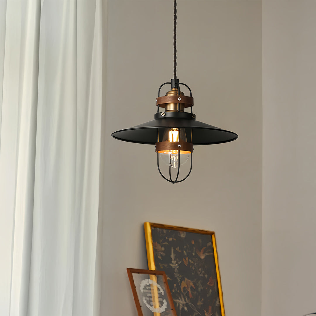 Edison bulb vintage hanging pendant lights with antique brass accent near window 