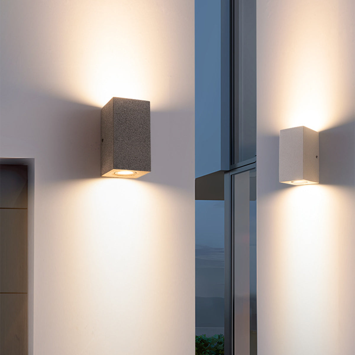 Modern concrete wall lights creating sophisticated lighting design on contemporary interior wall