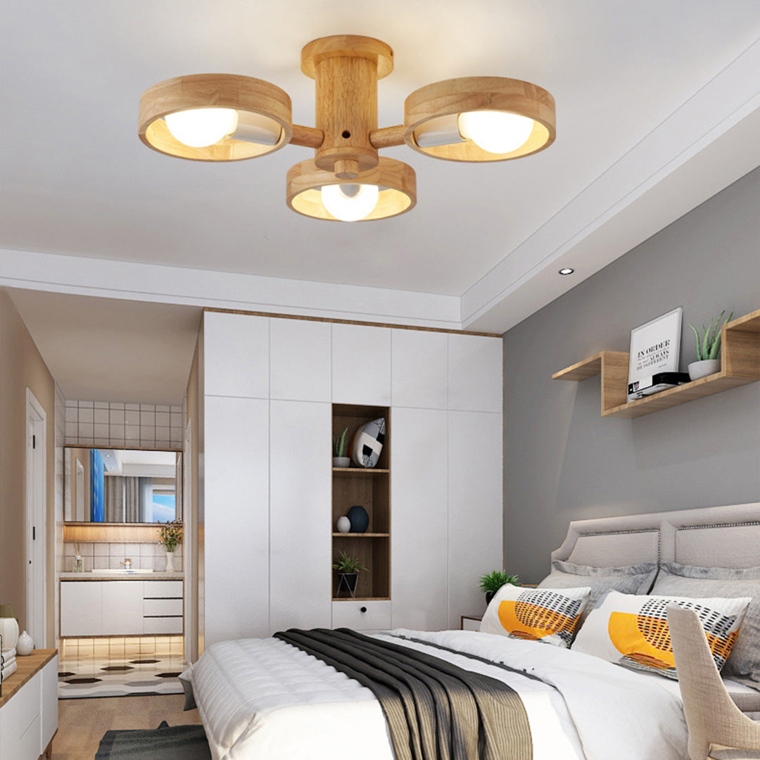 Elegant brass glass shade chandelier creating ambient lighting in sophisticated wall light application