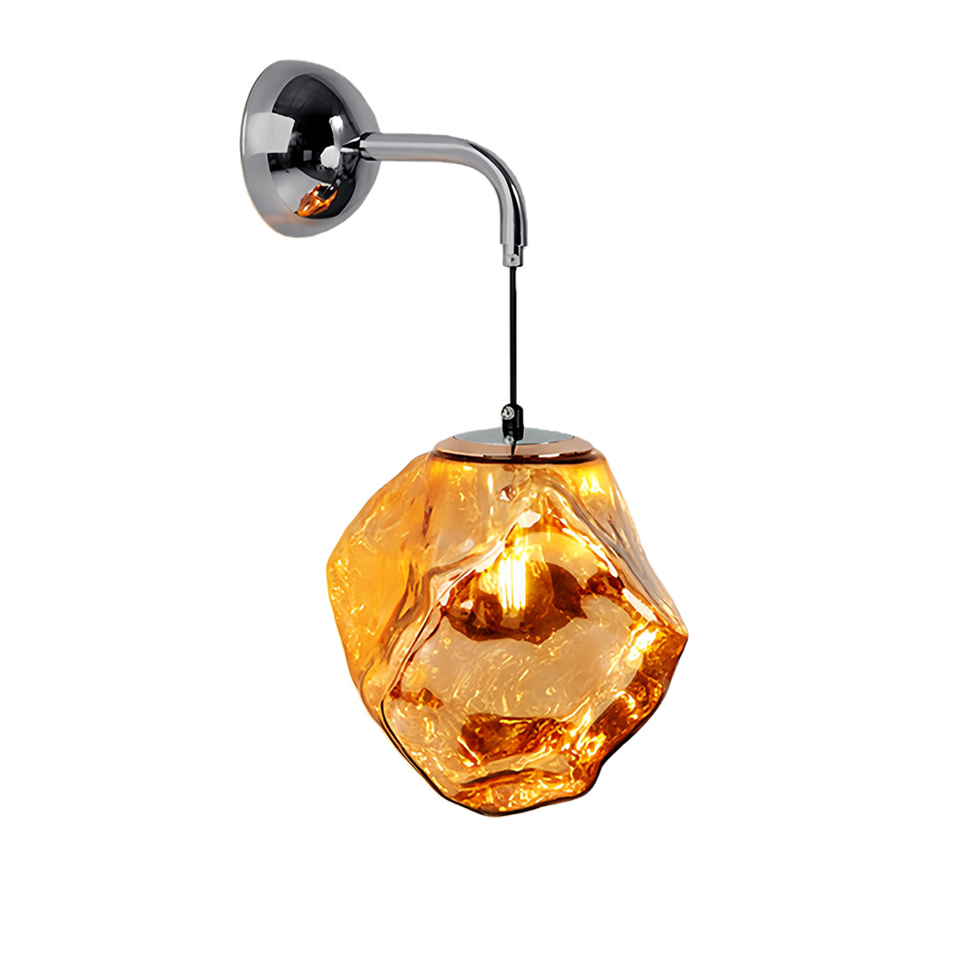 Elegant art deco wall sconce lighting with faceted amber glass shade and curved chrome mounting arm