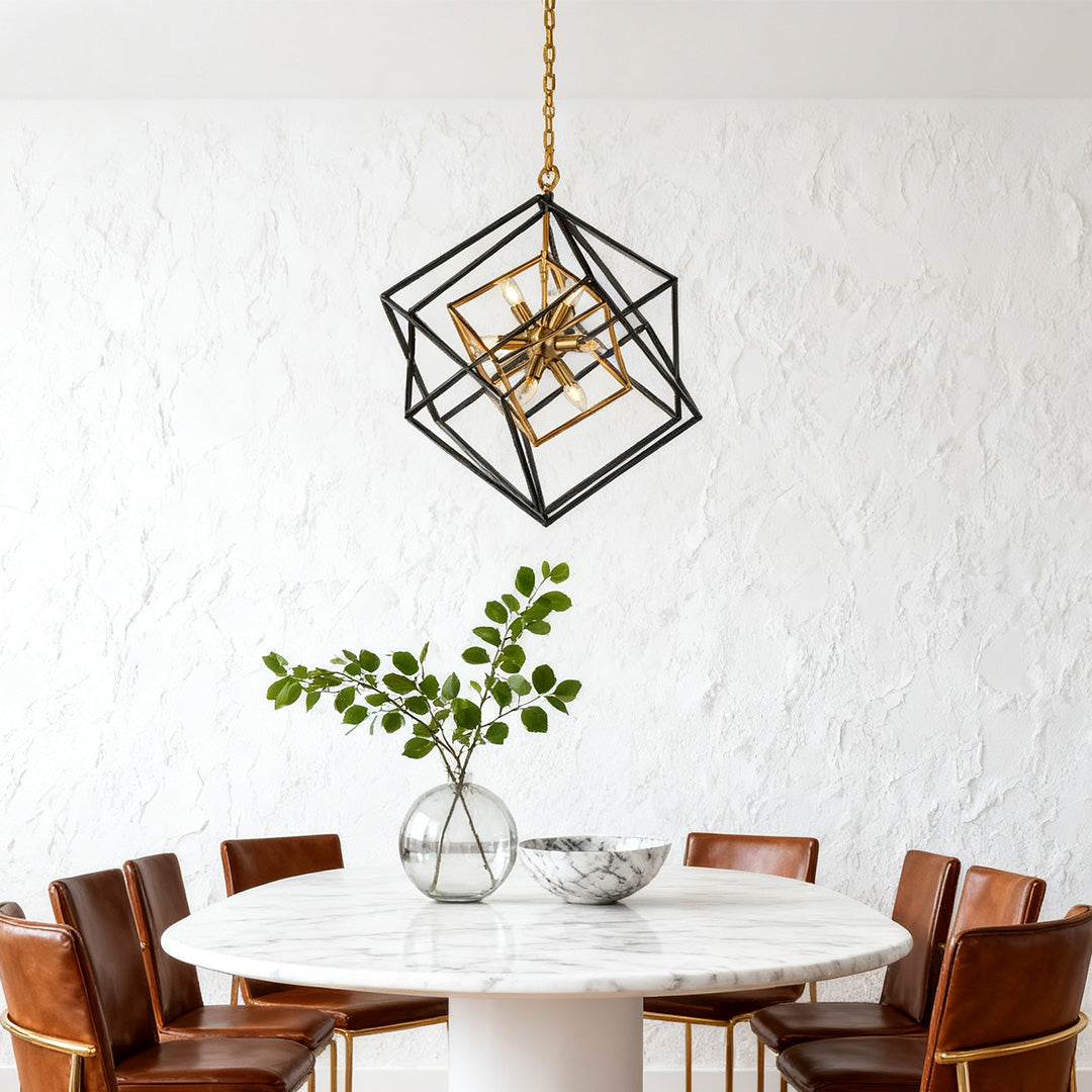 black and brass square pendant light above a round kitchen dining table