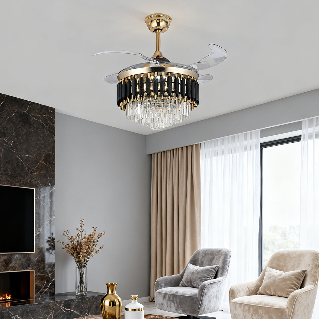 Elegant black ceiling fans with light and gold crystal shade in a modern living space 