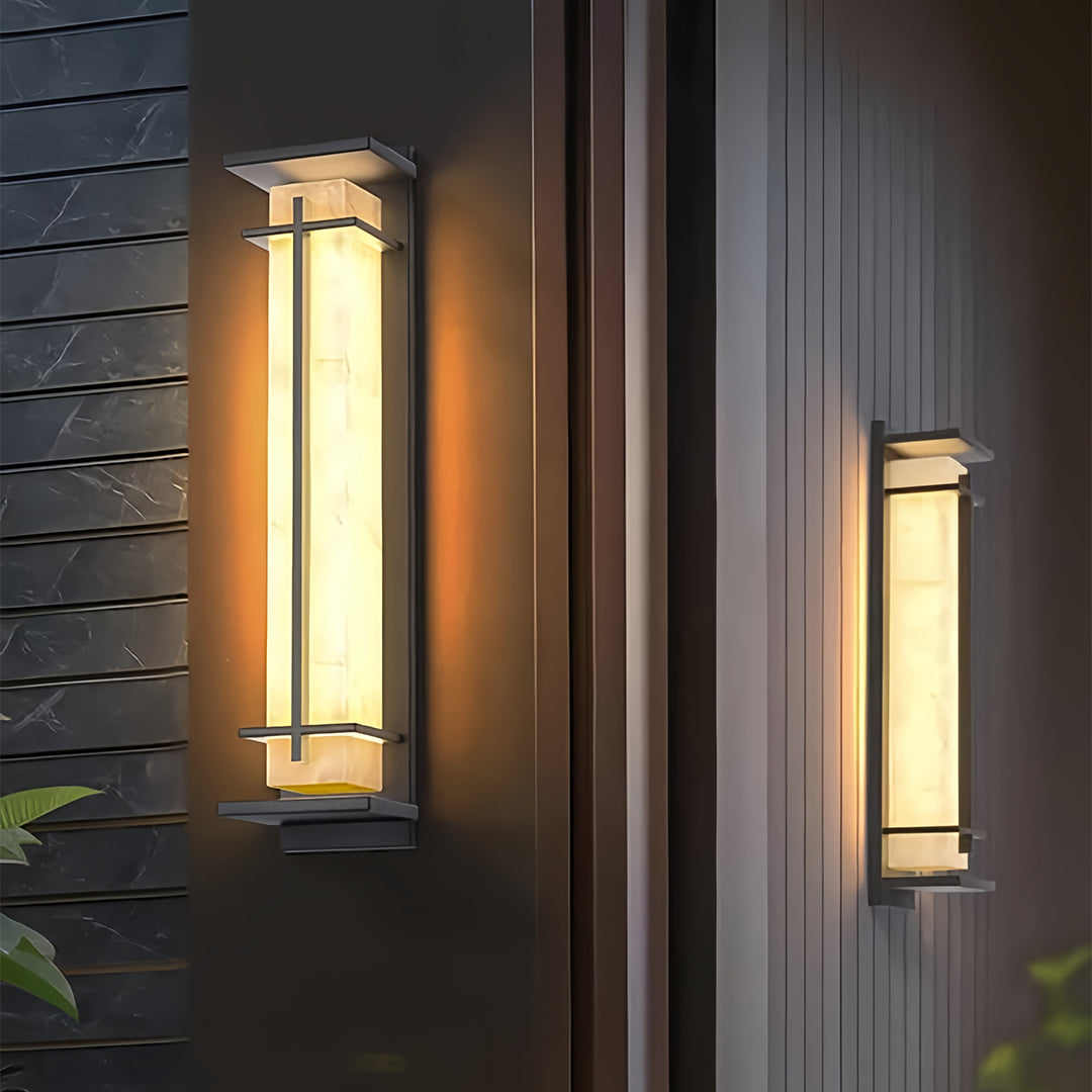 Elegant black outside wall lights shown mounted on a dark slatted wall and a modern grooved surface.