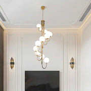 Elegant black spiral globe chandelier with cascading frosted globes hanging gracefully.