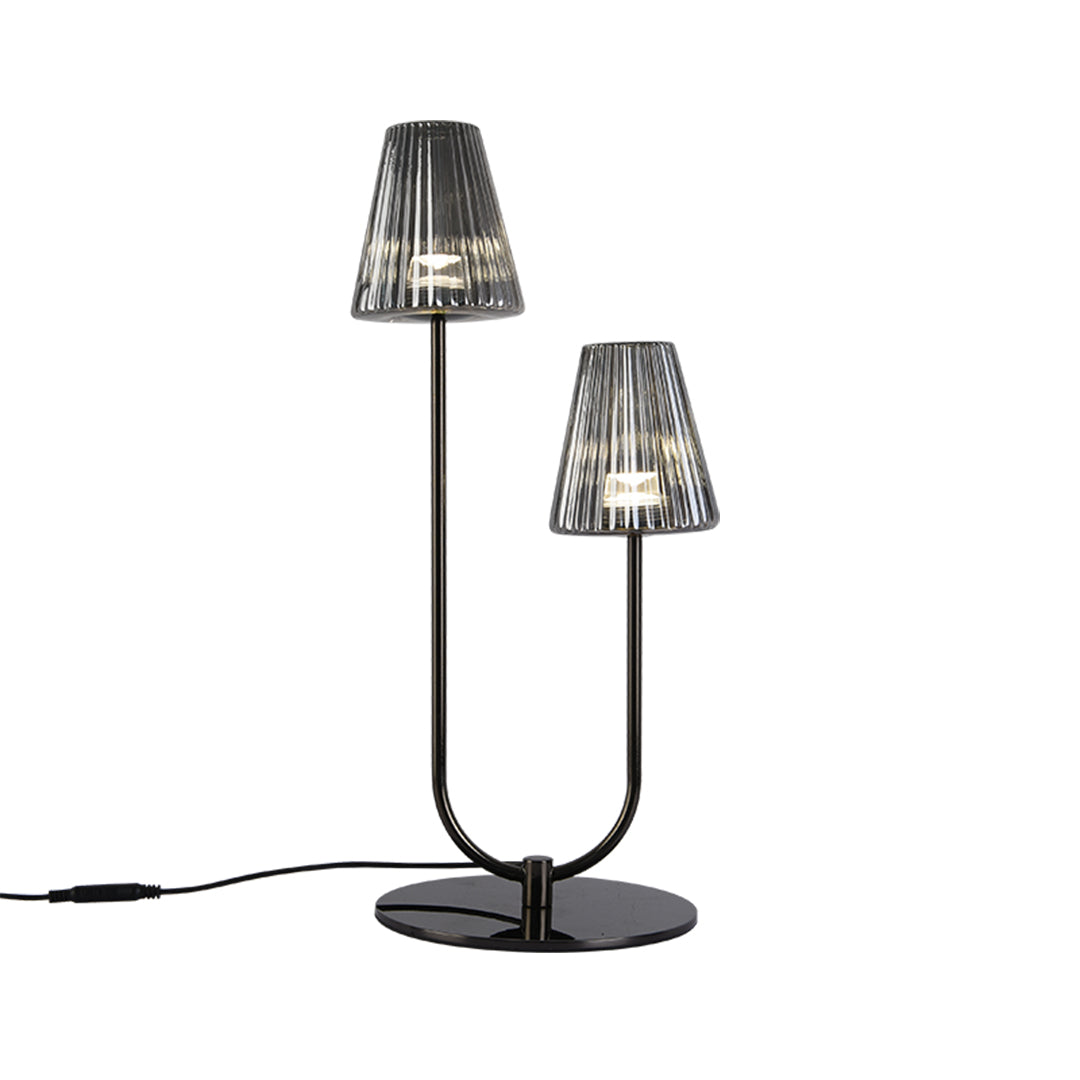 Elegant black metal table lamp with dual ribbed glass shades and curved contemporary design