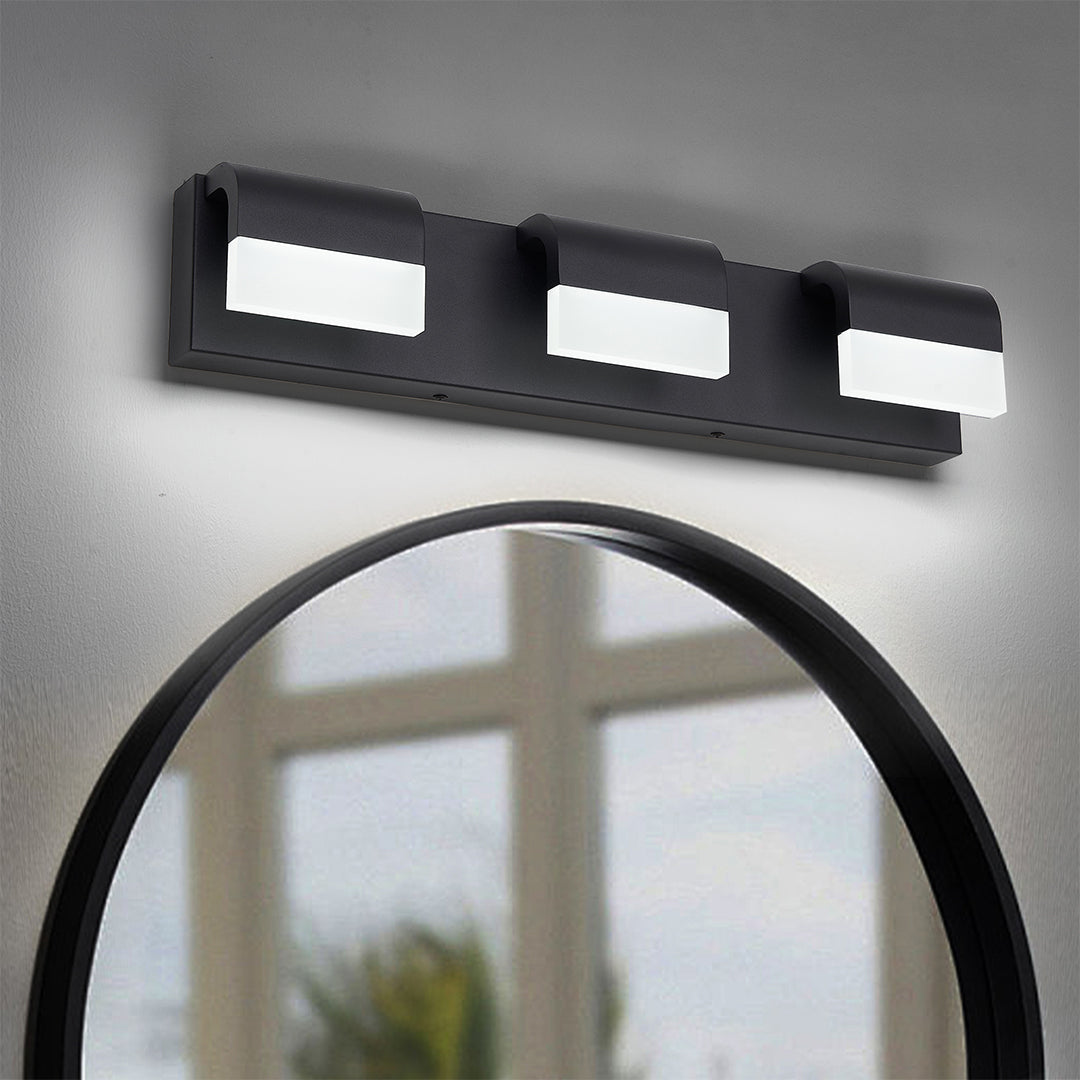 Elegant black vanity lighting for bathroom with glass shade chandelier design mounted on circular mirror in modern setting.