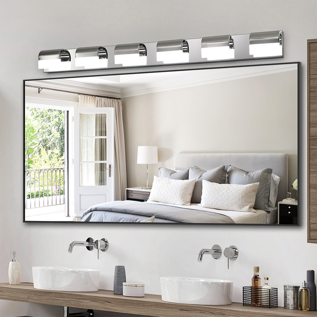 Elegant black vanity lighting for bathroom with glass shade chandelier design illuminating bright white dual-vanity bathroom.