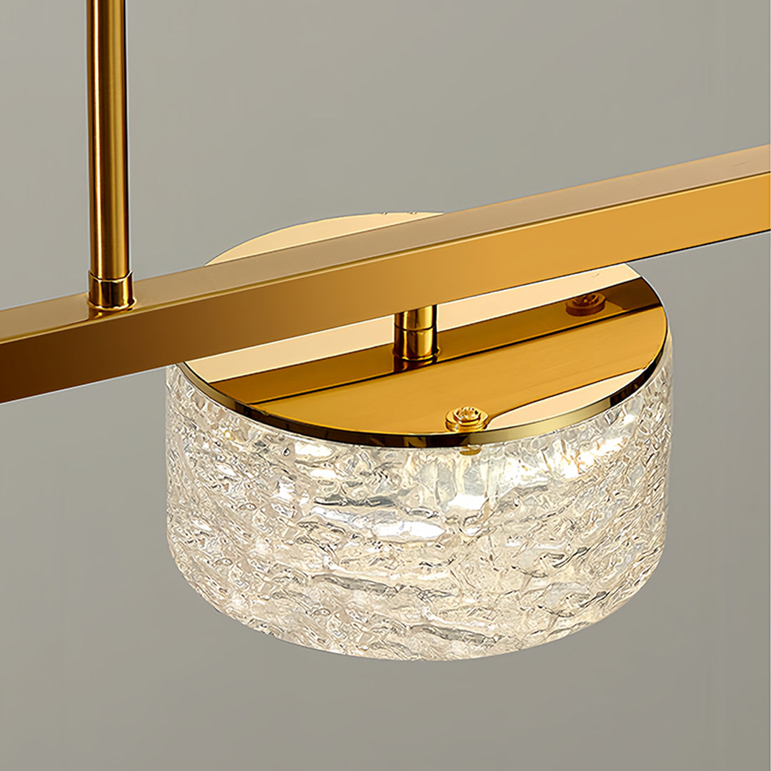 Elegant LED linear pendant light with brass and crystal design showing detailed craftsmanship and materials