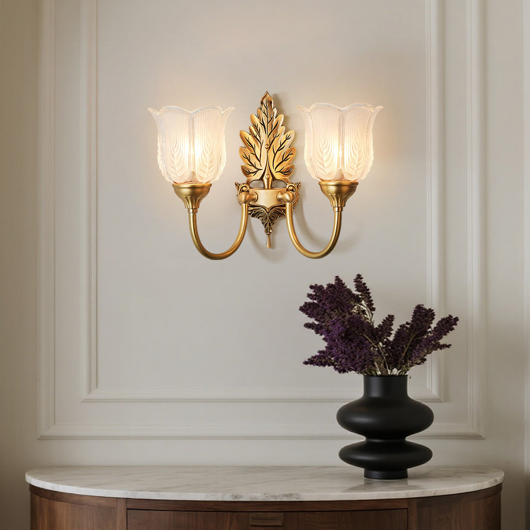 Elegant brass wall light providing warm ambient lighting in refined dining room setting