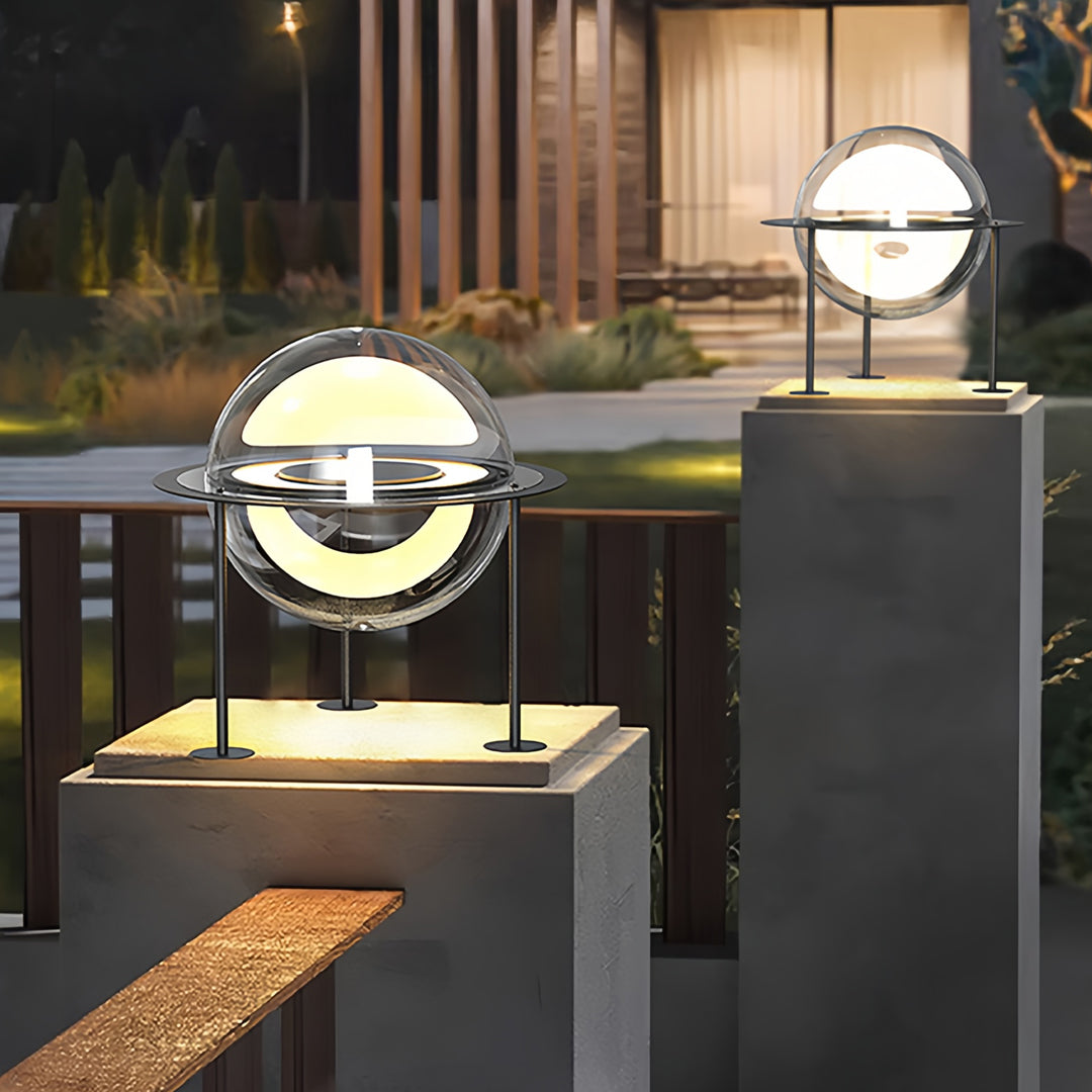Elegant modern circular main gate pillar light design placed on gate pillars providing soft ambient night lighting.