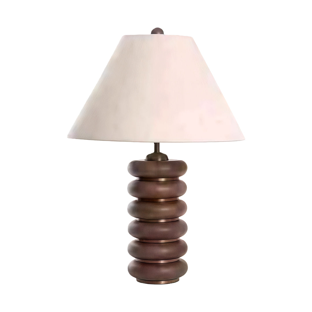 Elegant cloth table lamp with glass shade chandelier design in dark brown finish with layered disc base and off-white fabric shade.