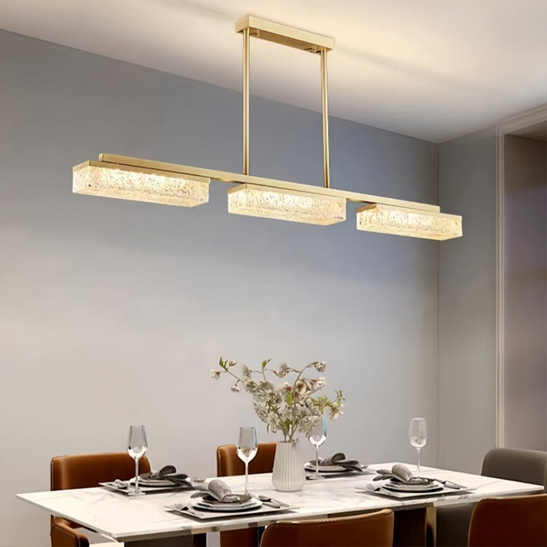 Elegant copper pendant lights for kitchen island illuminating contemporary dining space