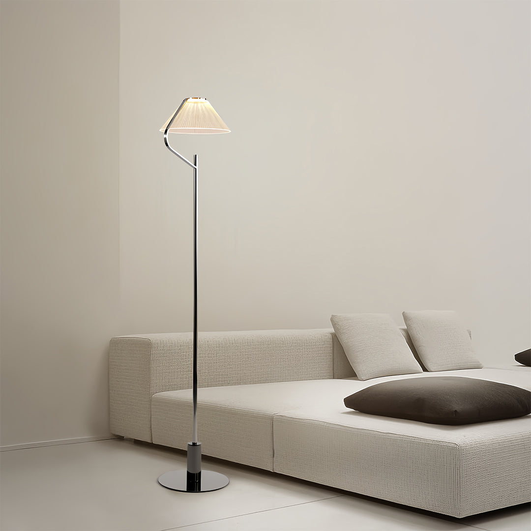 Elegant craft floor lamp with a white fabric shade in a cozy living room
