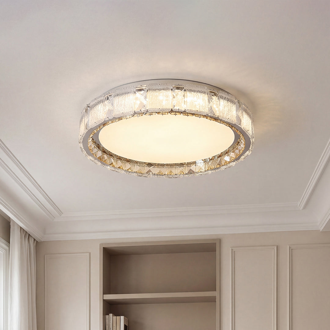 Elegant crystal flush mount ceiling lights with a silver frame and a frosted glowing center.