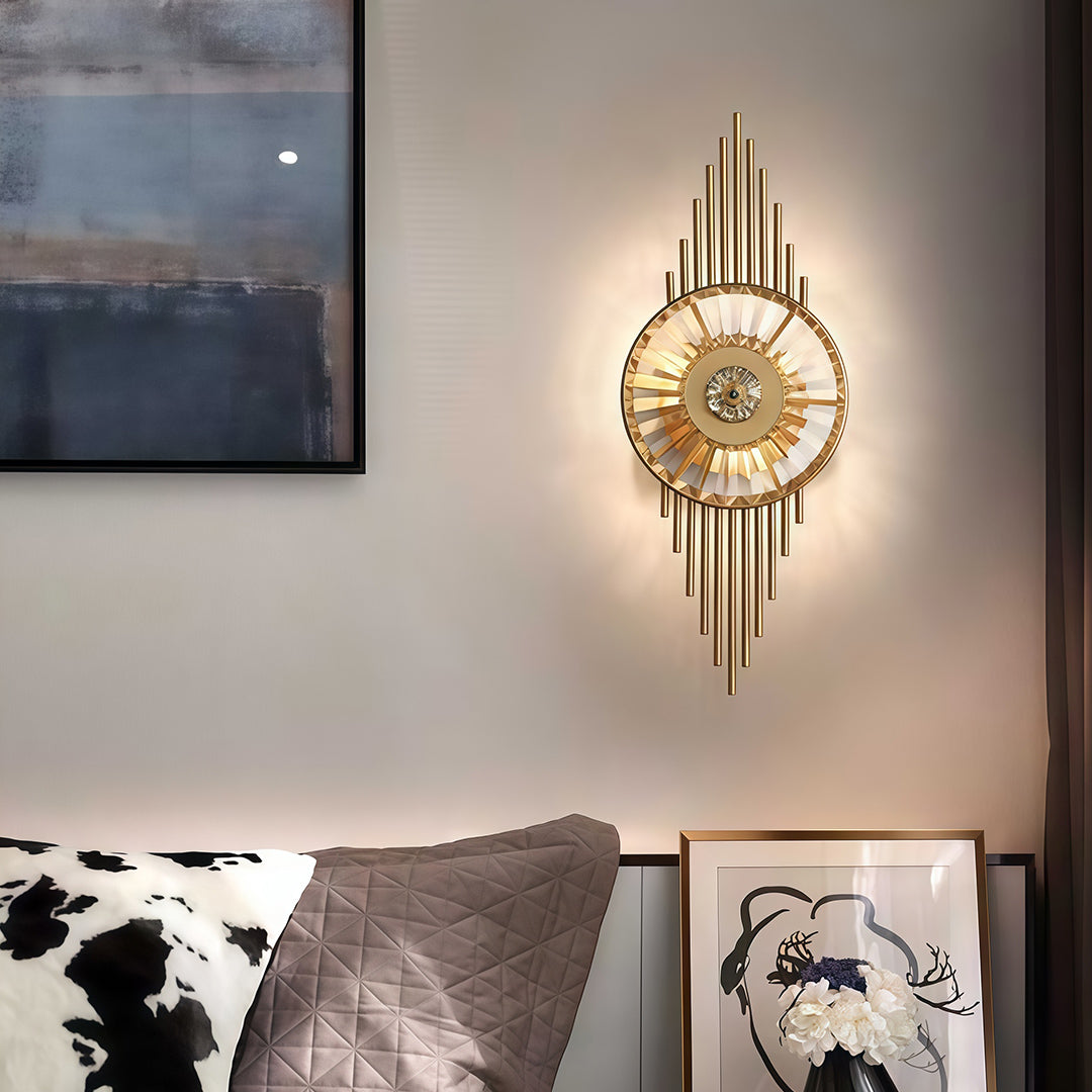 Elegant crystal light wall featuring glass shade chandelier design providing decorative accent lighting above bedroom headboard.