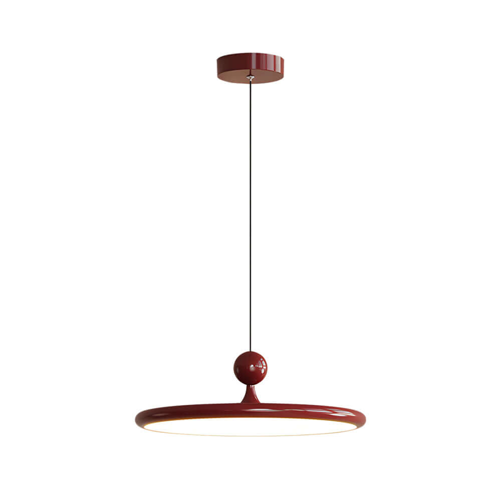 The Flying Saucer Pendant Light uses a refined acrylic disc inspired by French design, offering soft illumination and a modern UFO-like aesthetic suitable for luxury home spaces.