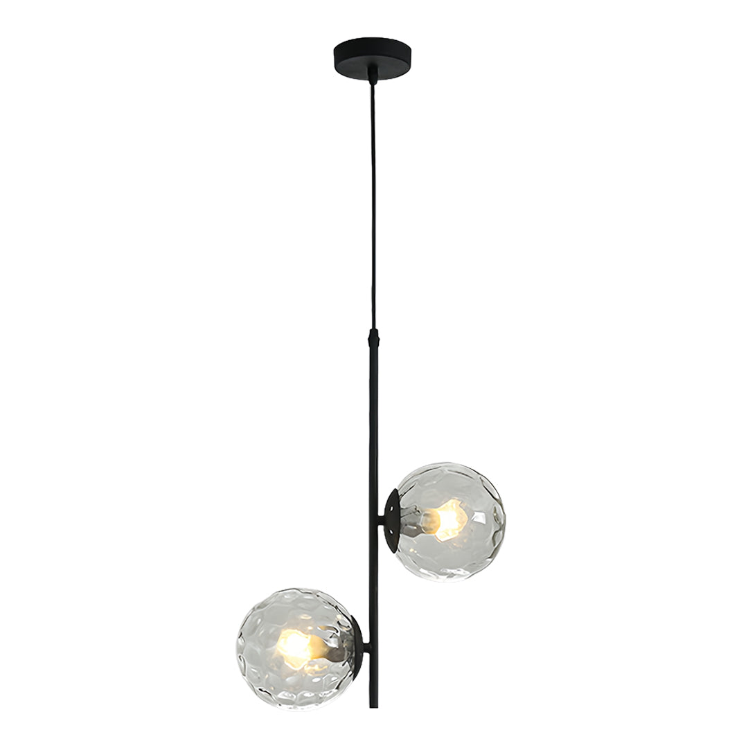 Elegant glass hanging pendant lights with smoke-tinted spheres and black ceiling mounts for sophisticated ambiance
