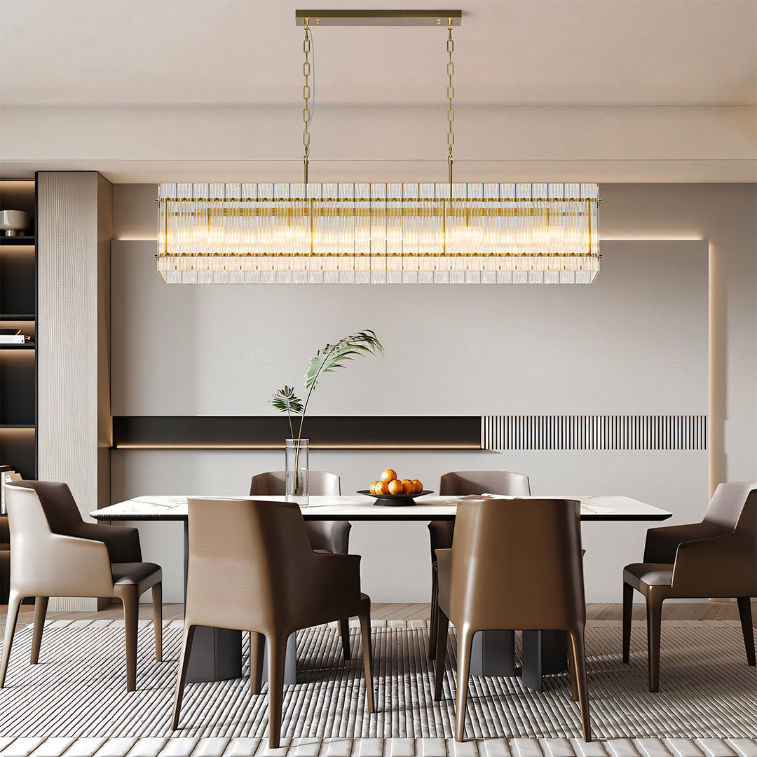 Elegant gold glass lamp shade chandelier enhancing a modern living room with large windows and neutral tones.