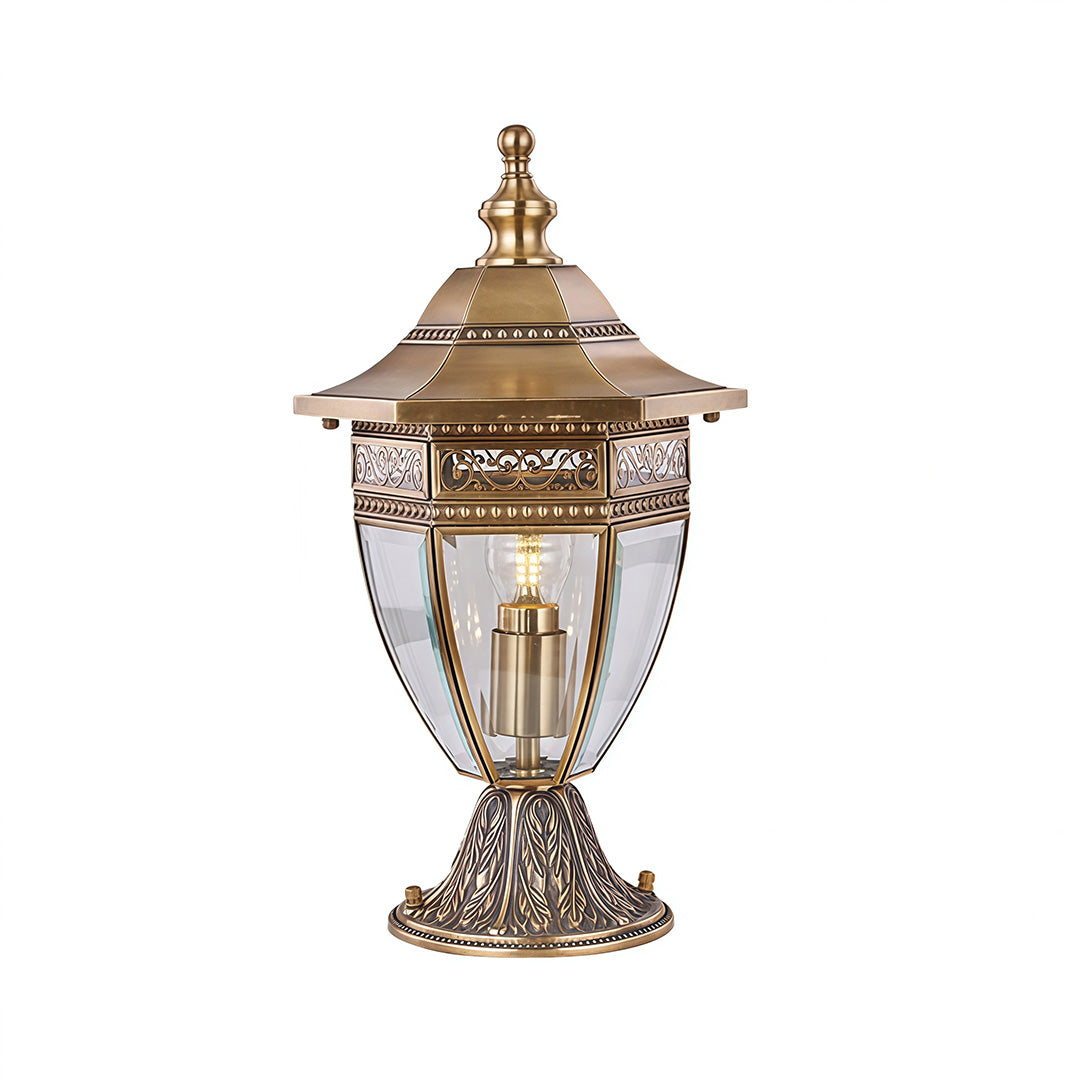 Elegant gold glass pillar light with detailed metalwork, ideal for adding a touch of sophistication to outdoor spaces.
