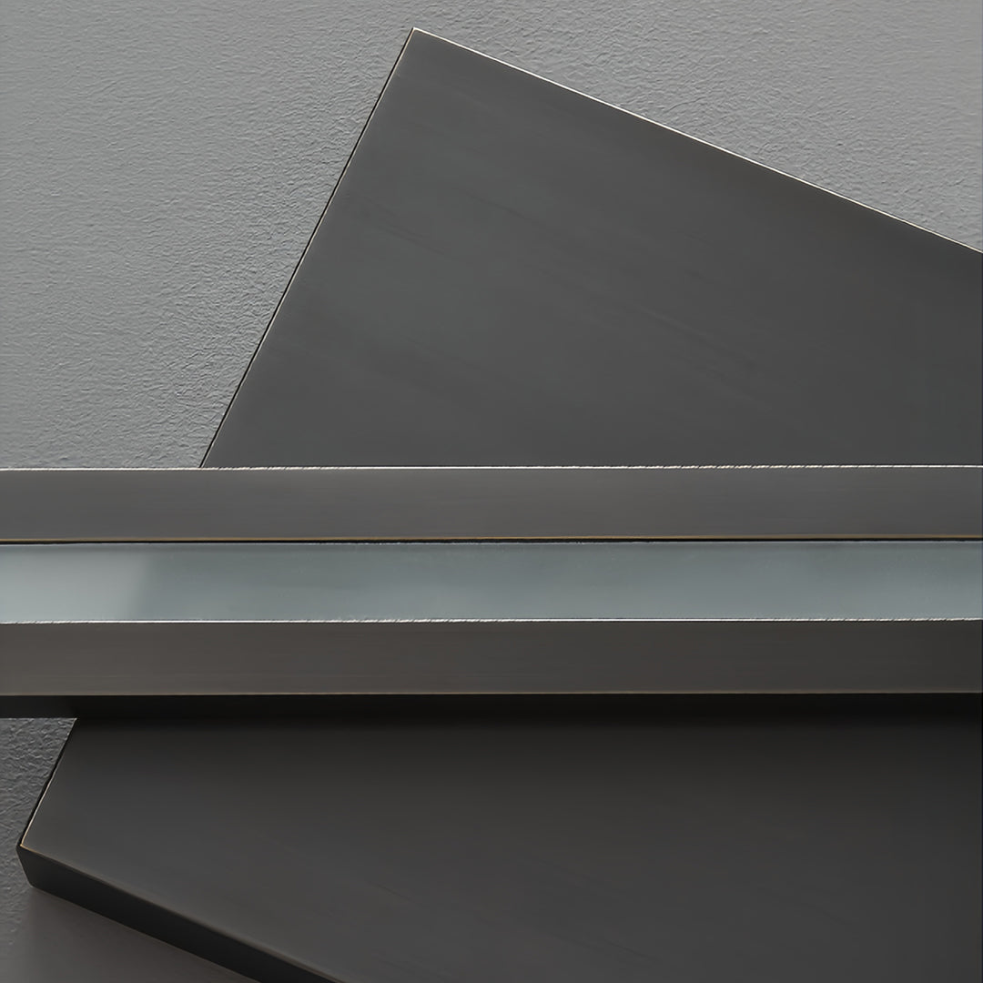 Elegant gold metal floor lamp with a diamond-shaped shade in a minimalist setting