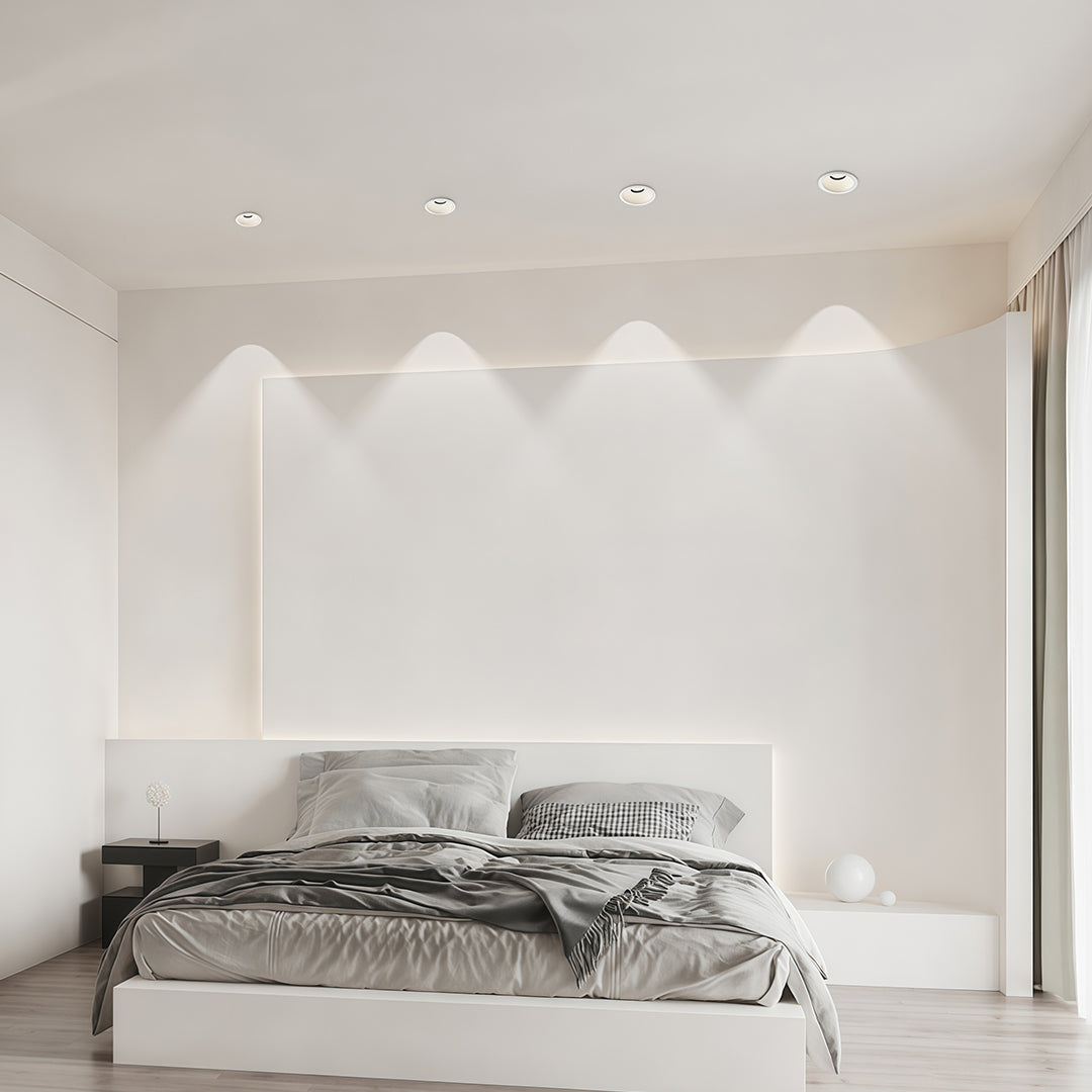 Elegant interior spotlights with glass shade chandelier aesthetic illuminating luxurious white bedroom with soft ambient lighting.