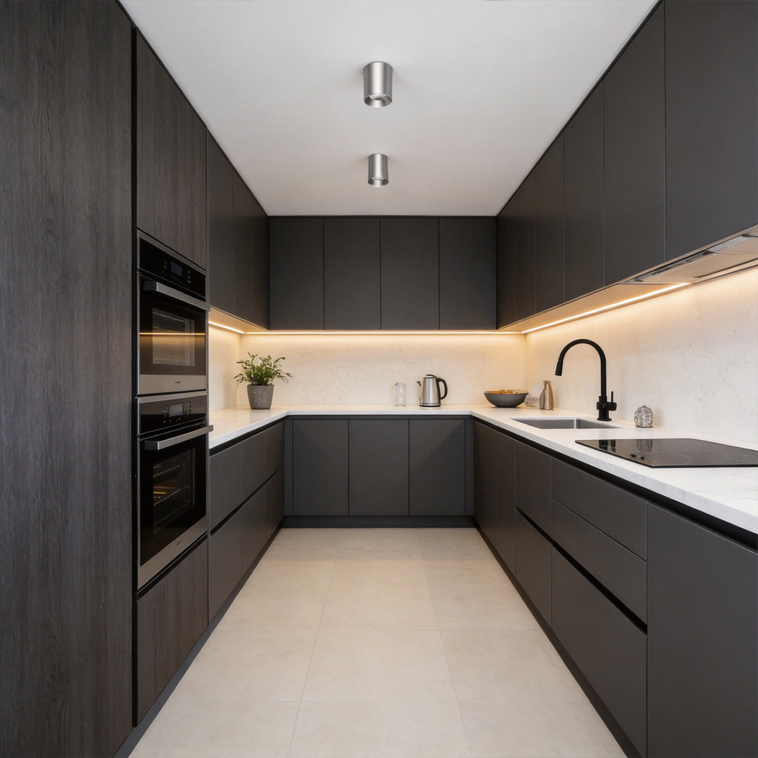 Elegant kitchen space featuring silver ceiling spotlights for an elevated look.