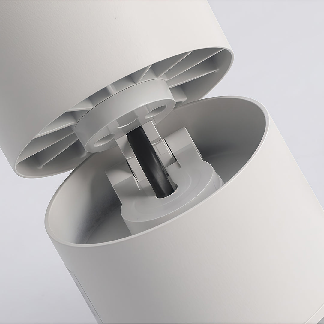 Elegant LED ceiling spotlights with glass shade chandelier influence creating striking sunset effect on gallery wall.